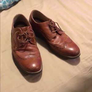 Cole Haan men’s brown dress shoes.